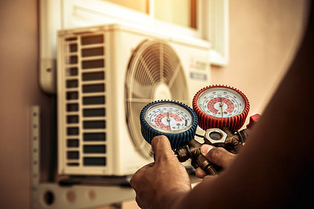 Professional Ac Installation technician working in Butlerville, IN